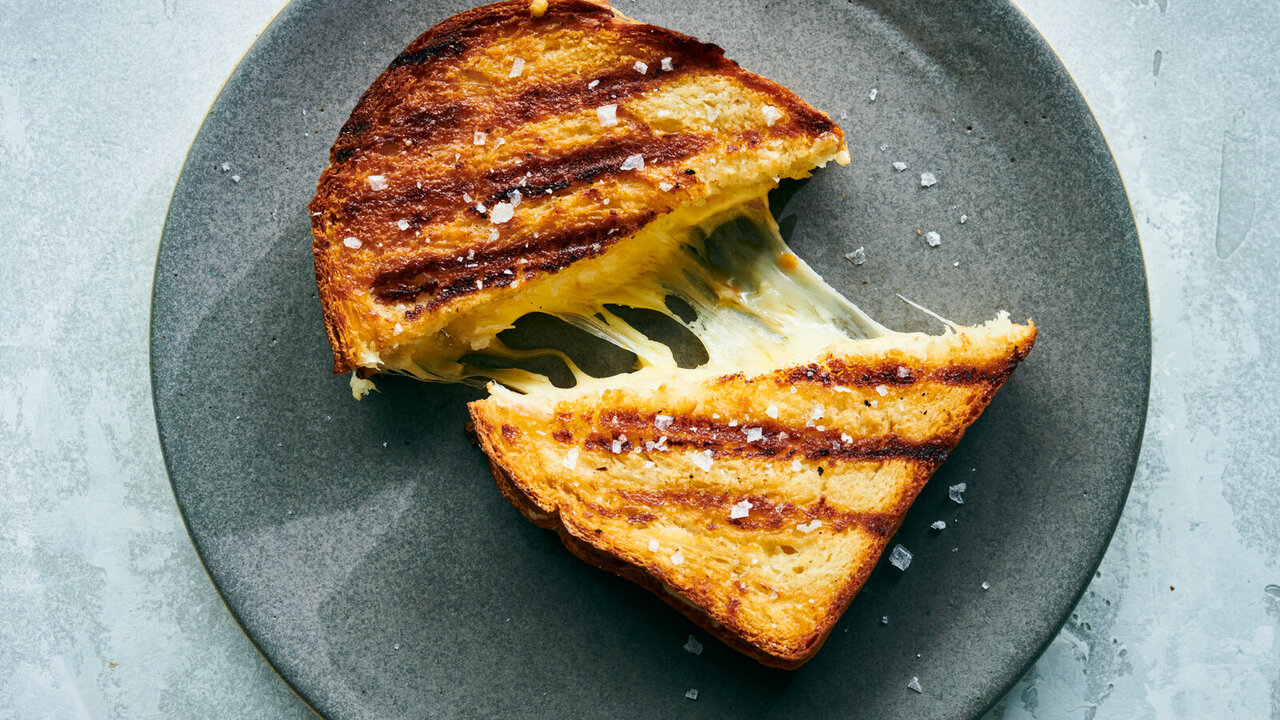 Placing The Cheese On The Grill